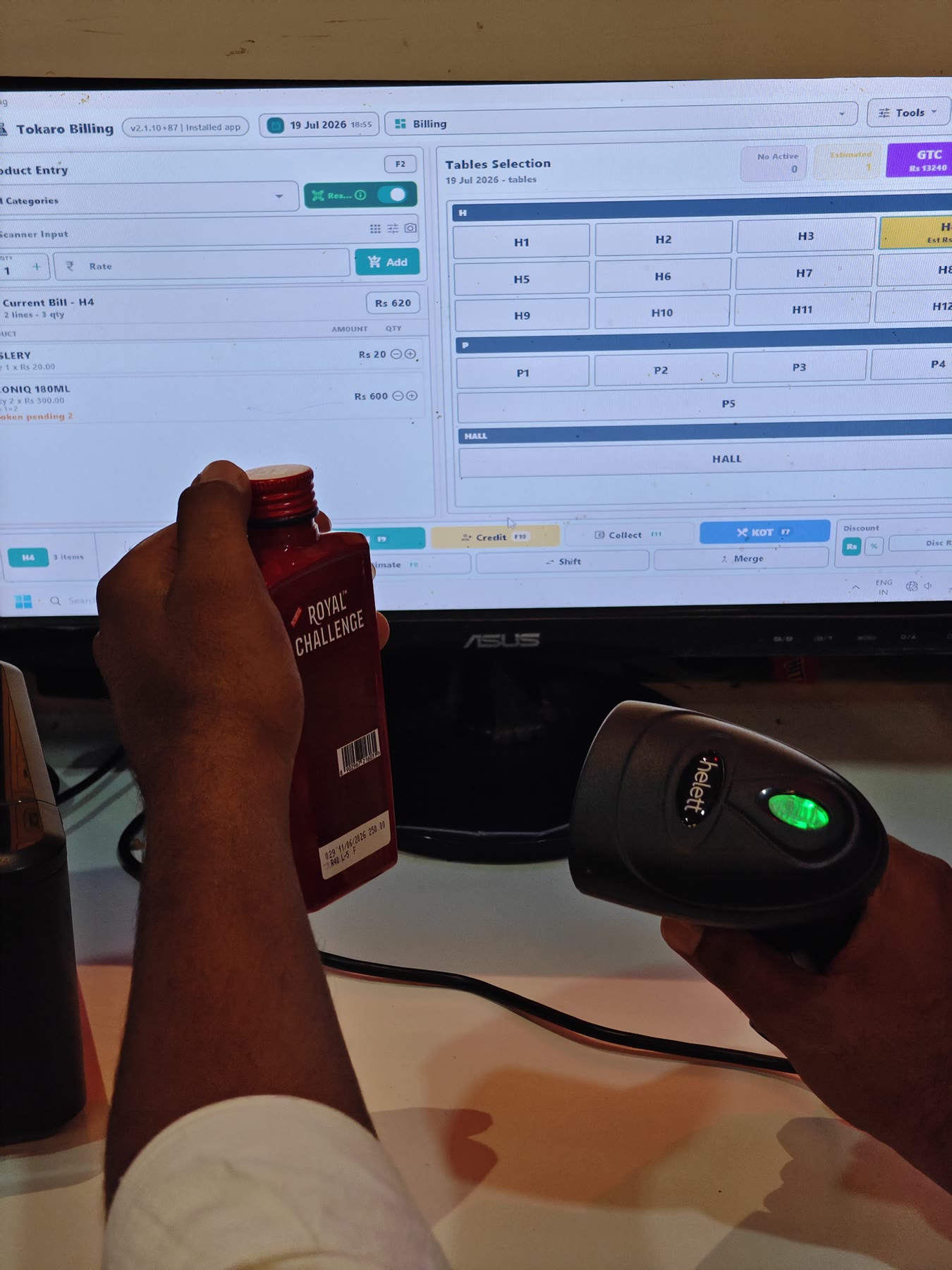 Barcode being scanned into Tokaro Billing at an active store